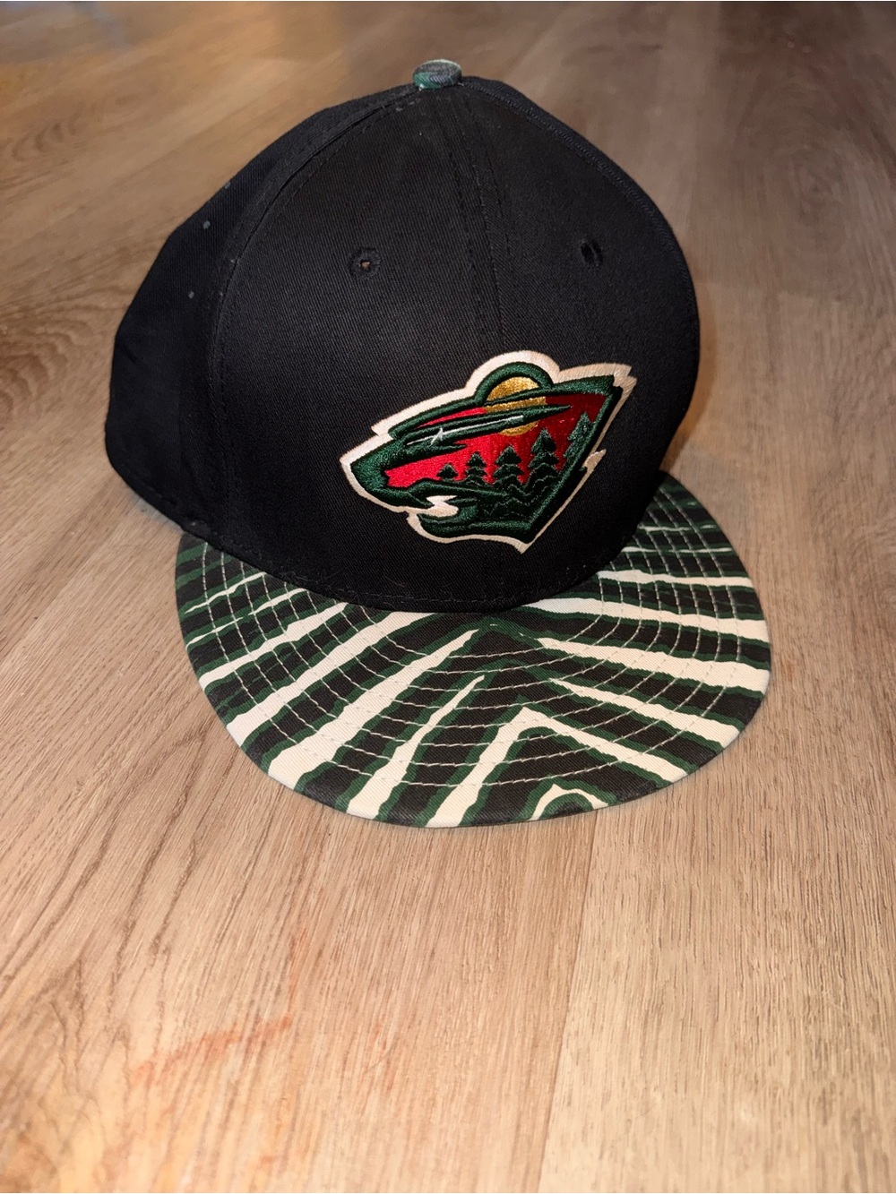 SOLD Minnesota Wild NHL Zubaz Black Snapback Hat with Green Patterned Brim